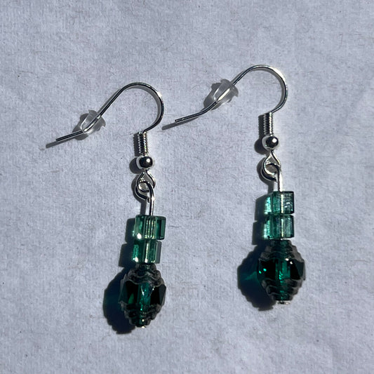 silver earrings with green beads