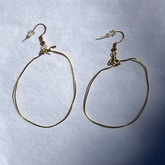 gold earrings with gold hoops