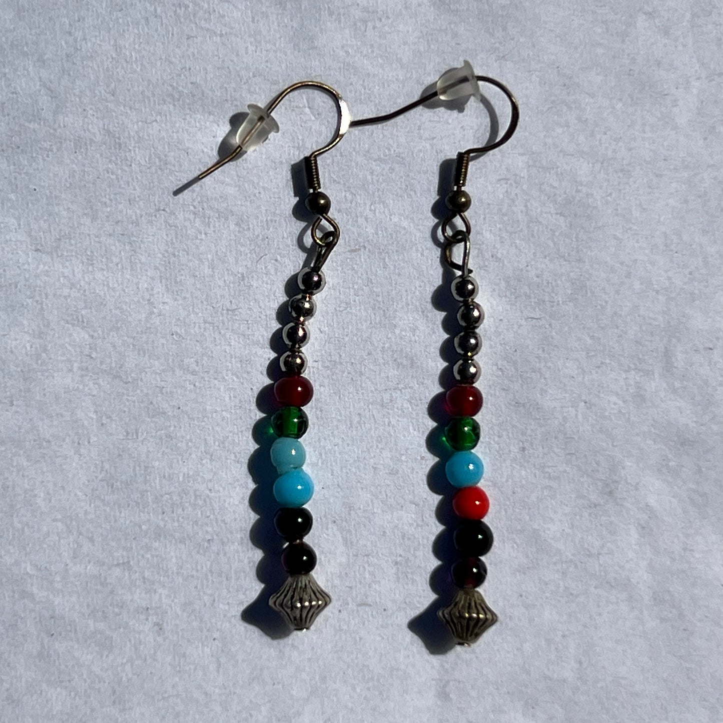 antique bronze colored earrings with multicolored beads