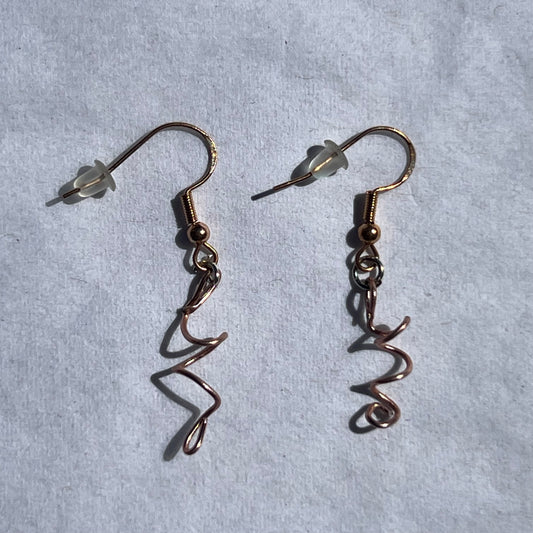 gold earrings with pink wire